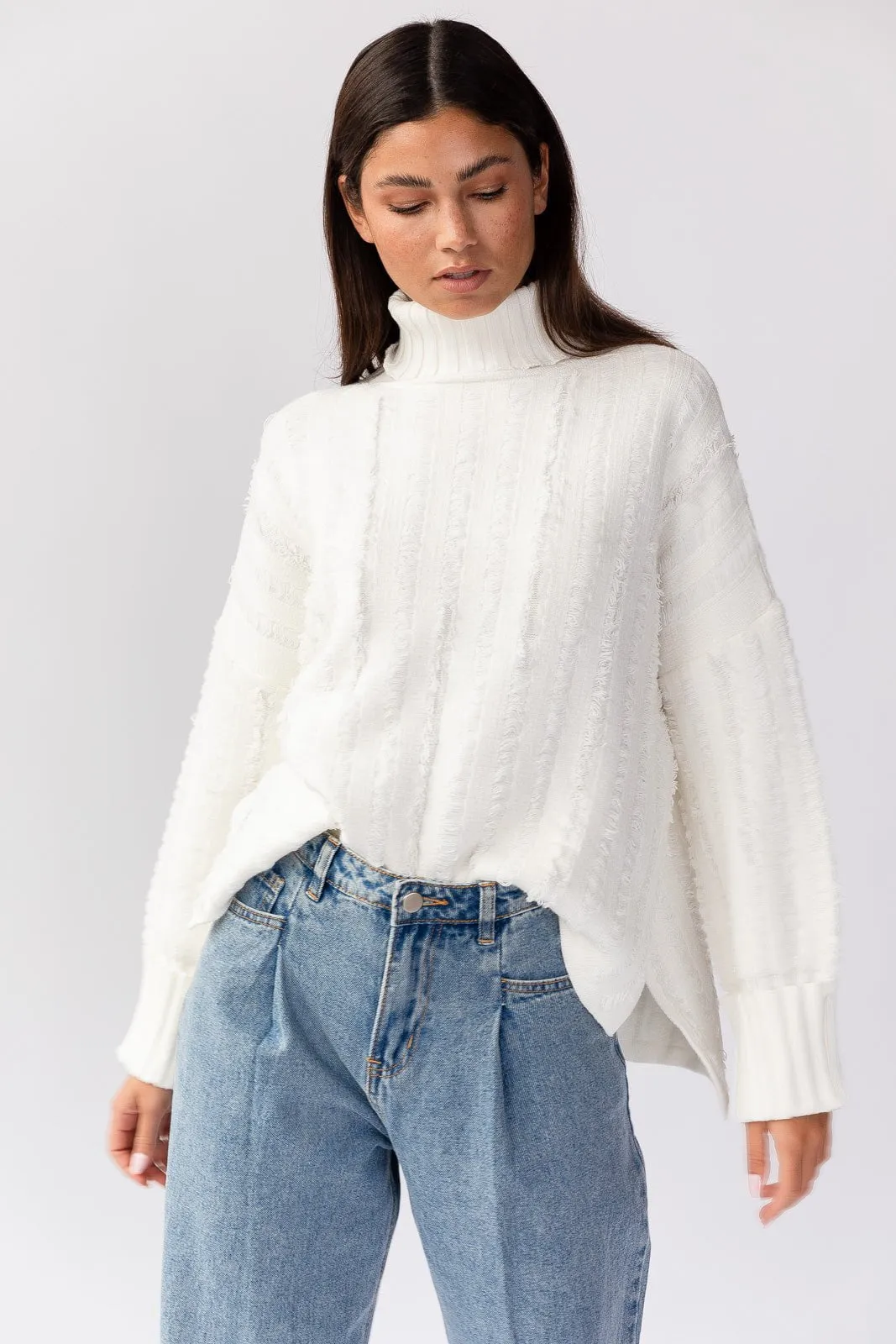 Recycled Fiber Polished Edge Dana Turtleneck Fringe Knit Sweater - White