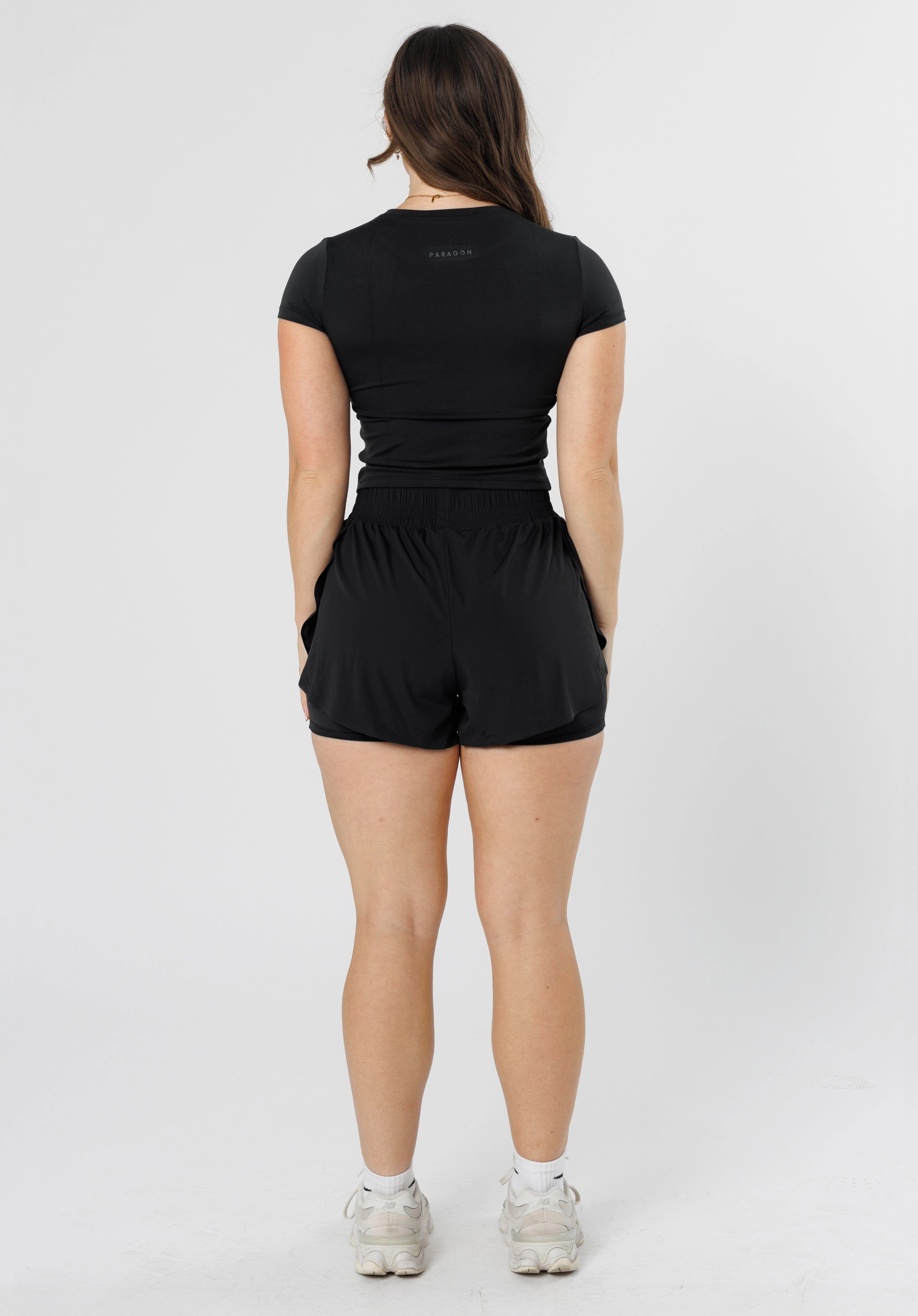 FeatherKnit? Momentum Trackshort Black cool tones Wide-leg cut