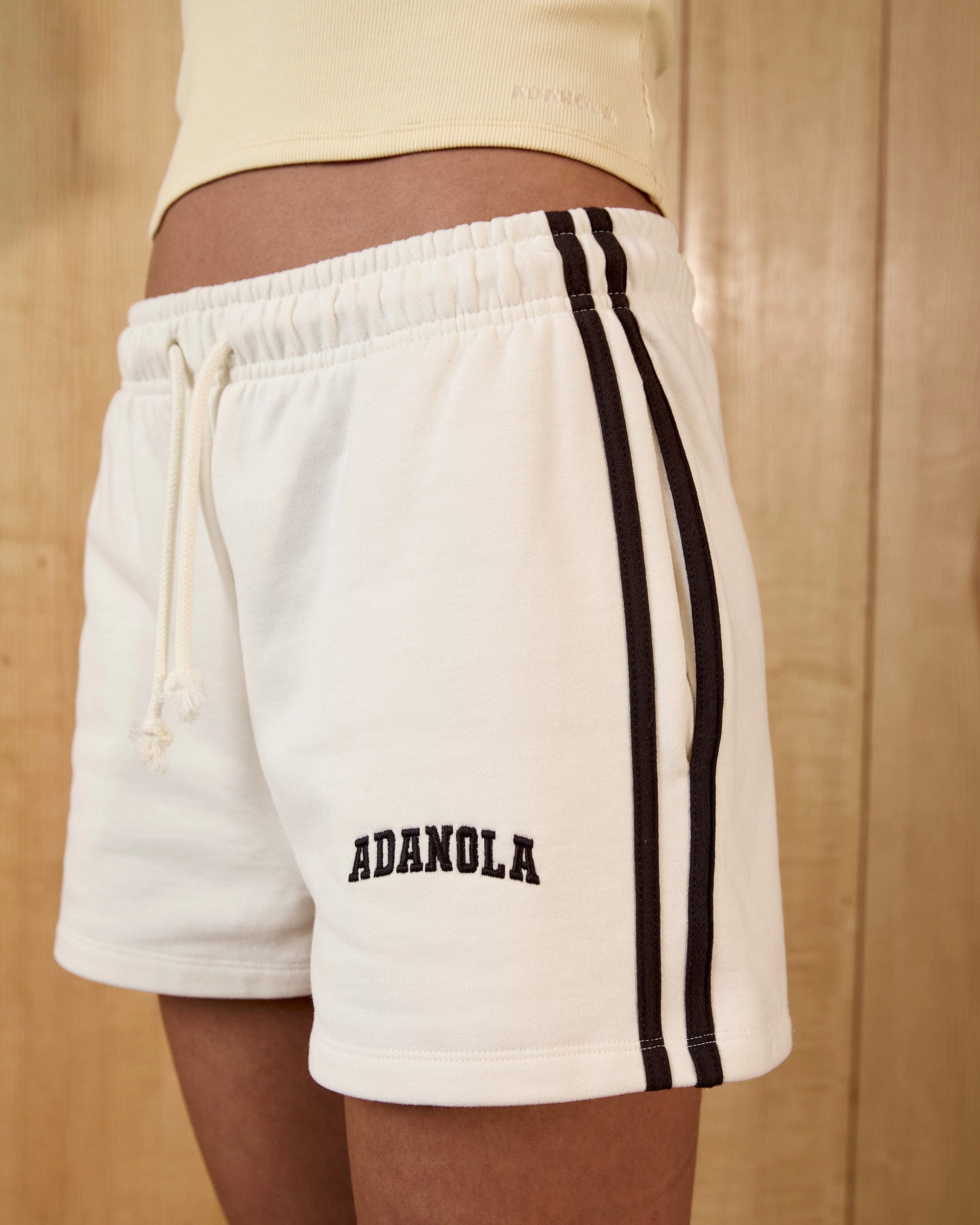 Sustainable Manufacturing Quick Layer Wear Varsity Loose Fit Sweat Shorts - Marshmallow White/Coffee Bean
