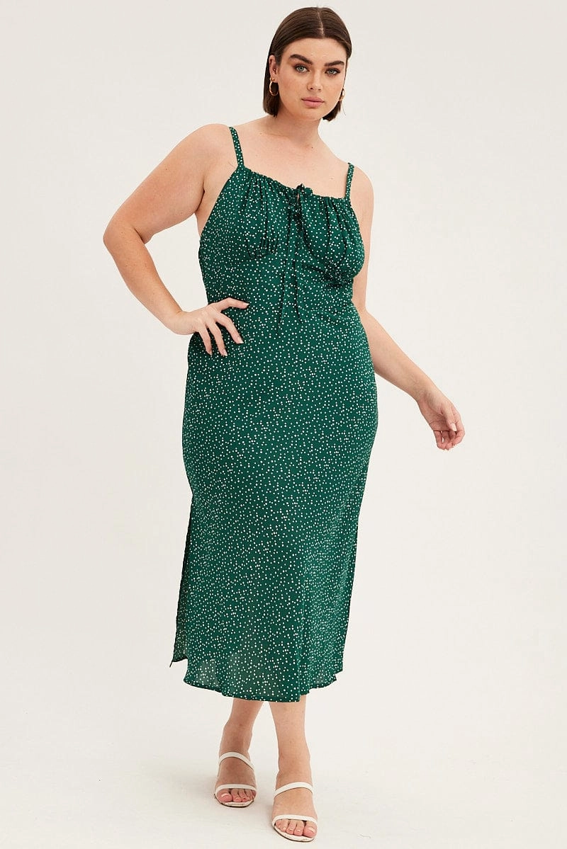 Green Polka Dot Midi Dress Sleeveless Ruched Bust Natural Light Modern and Stylish